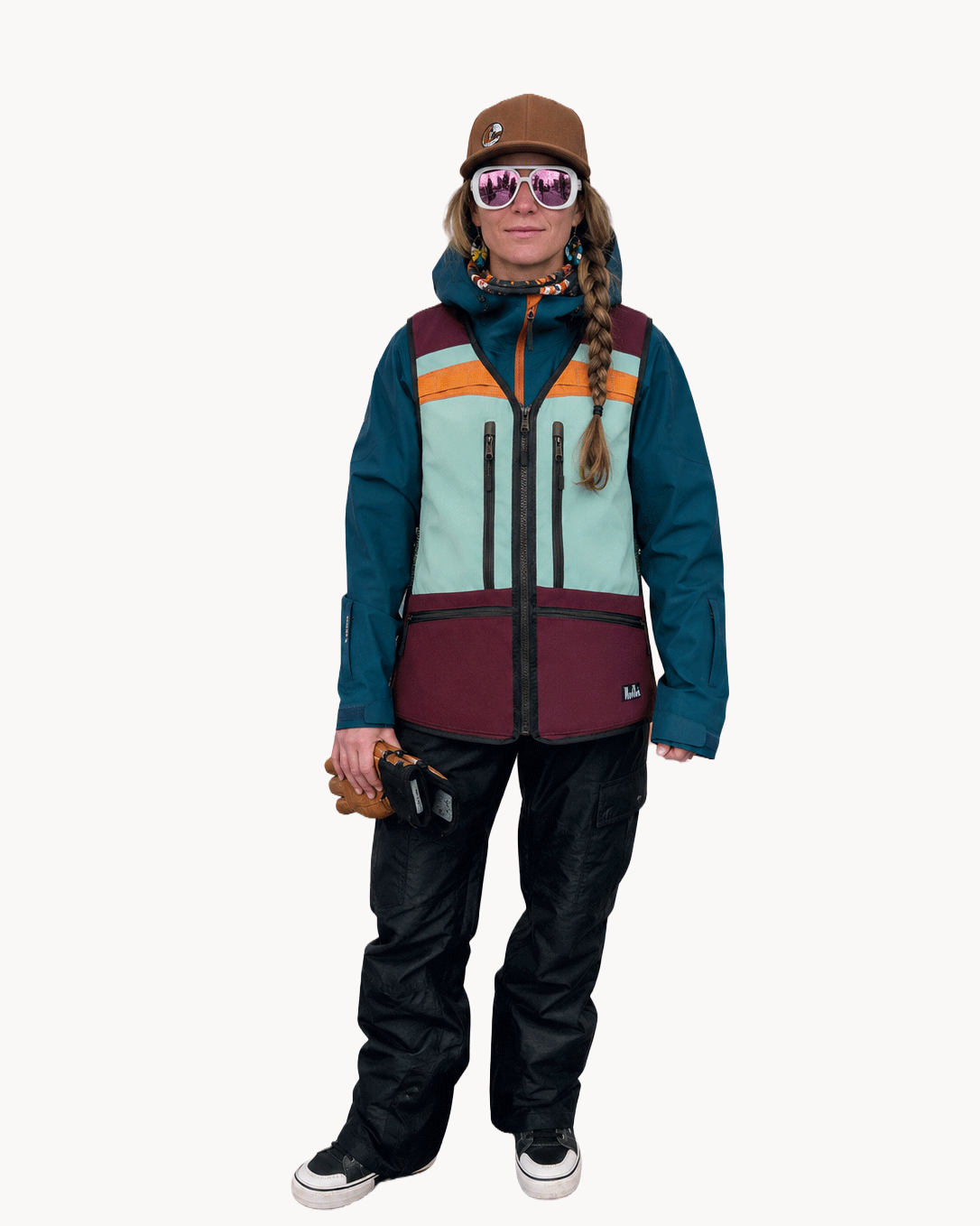 Nadia wearing a size S/M backpack utility vest, mint, maroon, rust orange
