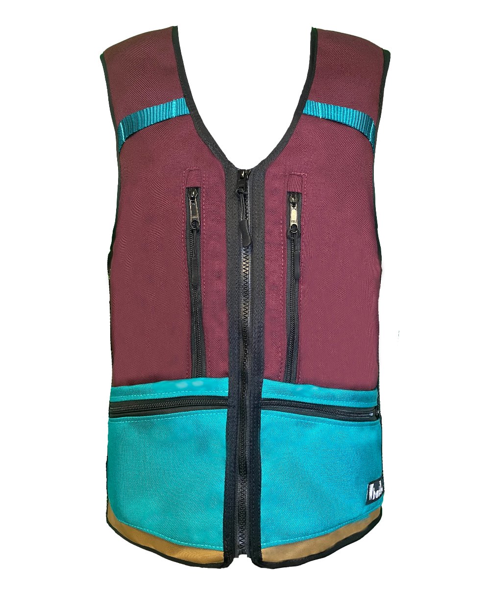 earthy tone ski vest backpack, women's ski snowboard apparel, teal turquoise ski kit, best 2024-2025 ski wear.